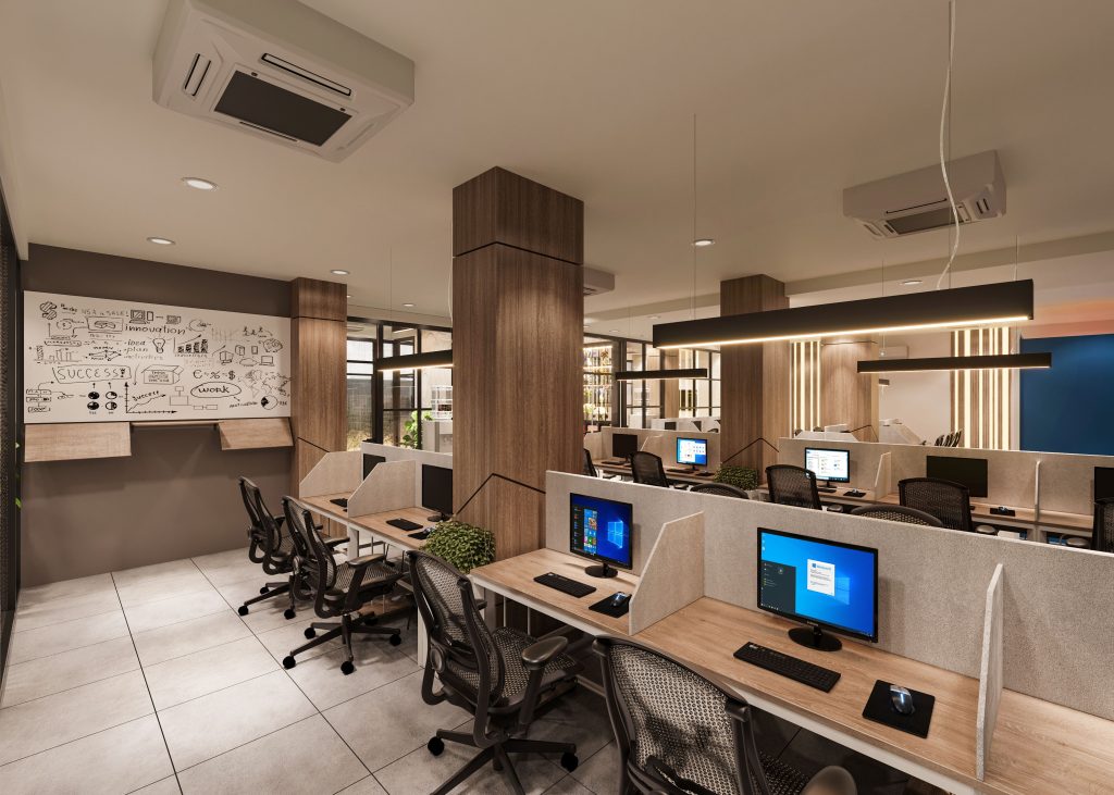Open space de bureau à Douala avec murs en gris clair, postes de travail bien éclairés